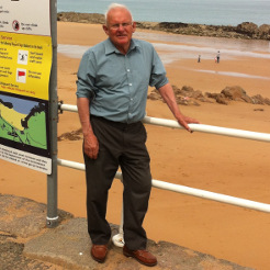Doorstuff founder, Preston Butland, stood at the beach.