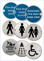 image of fire signange and different bathroom pictograms